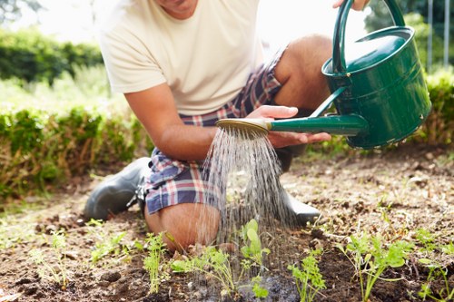 Low-carbon electric cargo van loading reclaimed planters for reuse